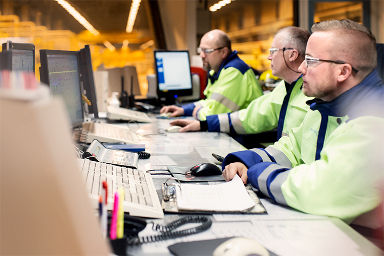 Operators in a control room, Cold Rolling Mill, Outokumpu Tornio Stainless Steel Operations